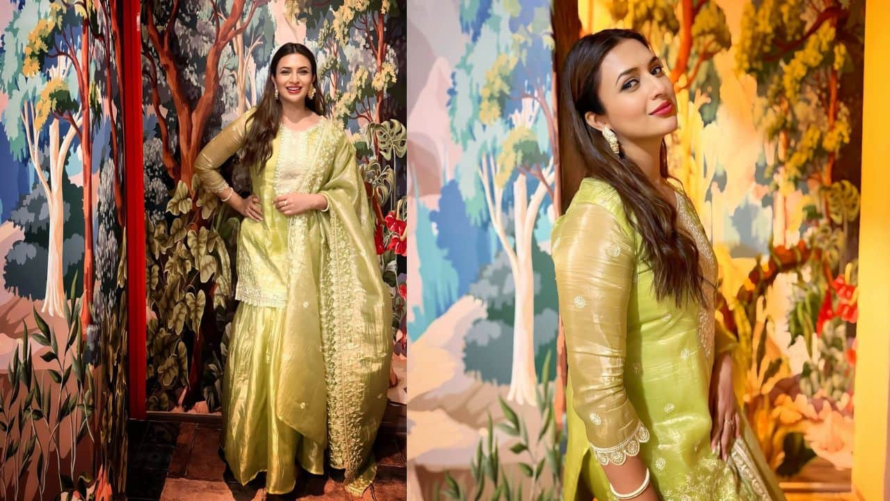Divyanka Tripathi A glowing shade of subtle gold already gives out the festive vibe and a mid length kuri with a flowy skirt is something unique which not everyone can carry. Divyanka looks every bit graceful in the outfit. 