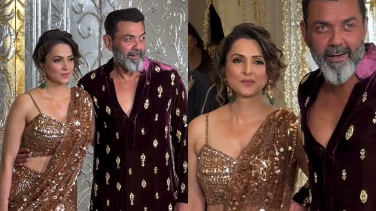 Tanya Deol and Bobby Deol Actor Bobby Deol and his wife Tanya Deol made a striking entry at Manish Malhotra's Diwali party. The actor looked in a maroon velvet kurta stone the limelight, while her wife alongside him looked stunning in a bronze glittery saree with a strappy blouse. The couple showed festive elegance, while beautifully complementing each other at the grand event.