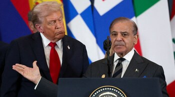 Pakistani Prime Minister Shehbaz Sharif (R) speaks as US President Donald Trump listens during the Gaza summit in Sharm El-Sheikh on October 13, 2025. (Photo by Suzanne Plunkett / POOL / AFP)