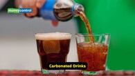 <strong>Carbonated Drinks</strong><br />Soda or fizzy drinks fill your stomach with gas, causing bloating and discomfort. They’re particularly bad when you’re hungover and your stomach is empty.