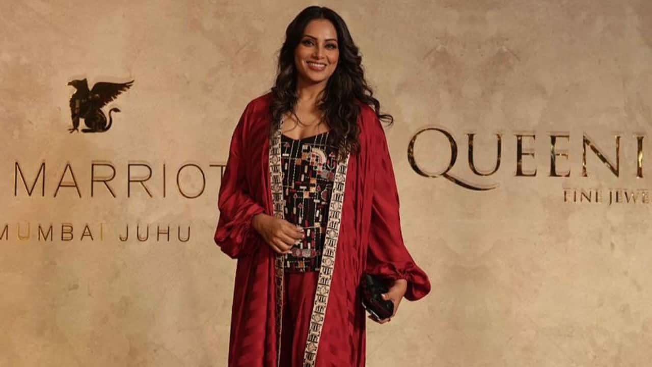 Bipasha Basu — Stunned in a striking black-and-red outfit, exuding confidence and glamour as she graced the event.