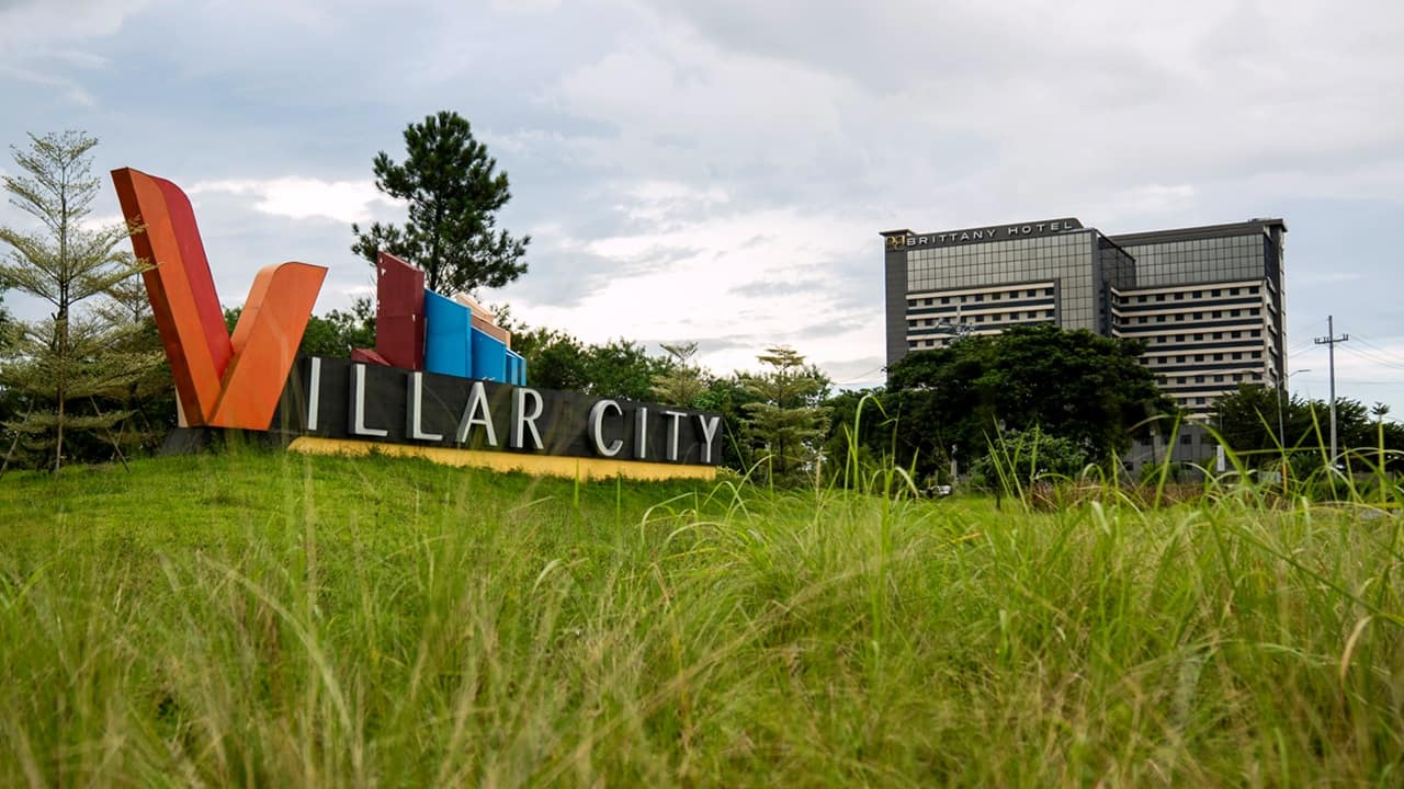 Philippines’ richest man faces scrutiny over empty land’s 25,000% value gain