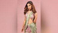 <strong>Saiee Manjrekar</strong><br />Wearing a light green floral saree with pink accessories, Saiee Manjrekar offers a stunning Diwali look. The deep V-neck blouse with heavy pattern work, likely in a contrasting color like pink, looks stunning on the actress with the saree, having Silver Silk Line Georgette with digital print and silk lines. This gives the traditional outfit a glamorous and modern edge that is ideal for festive gatherings.