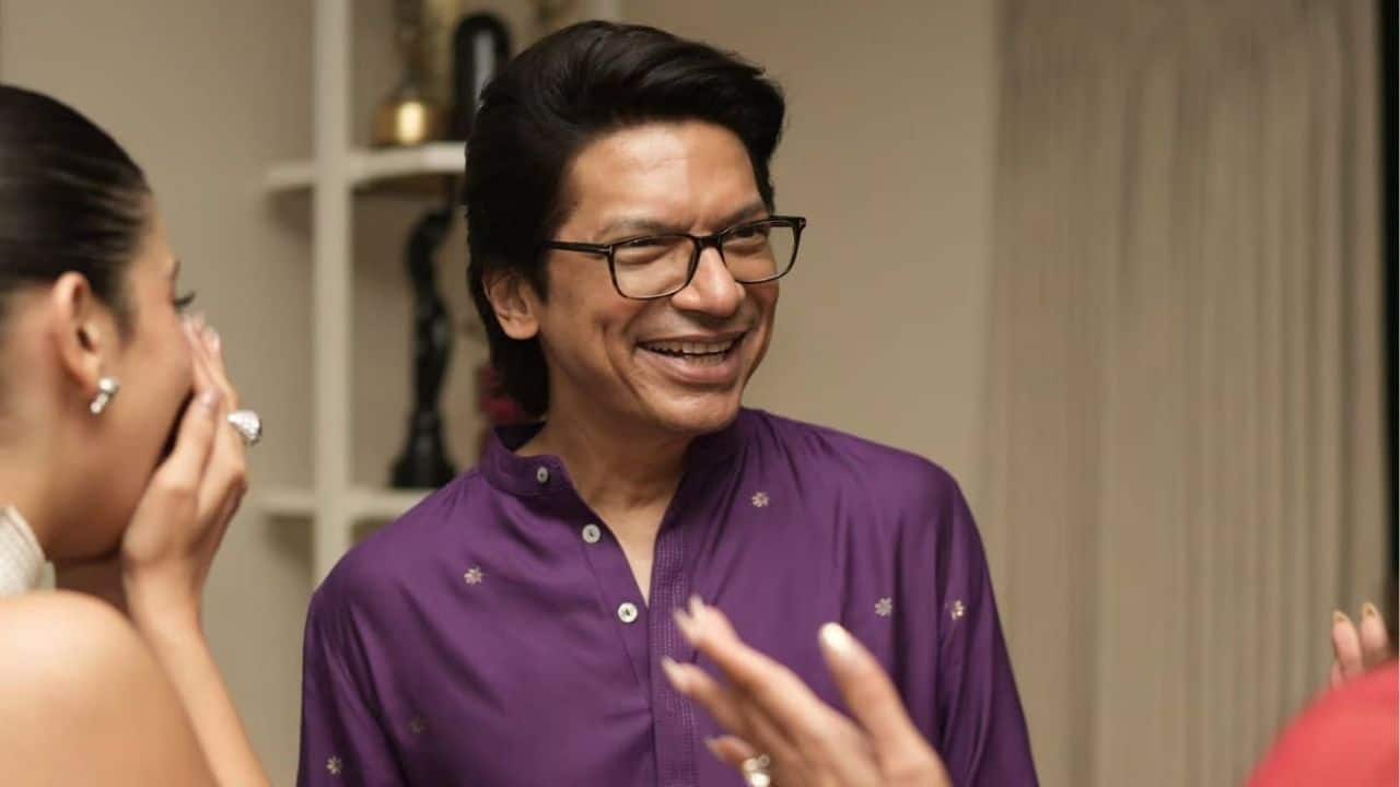 In the second image, veteran singer Shaan is seen sharing a light-hearted conversation with guests at the celebration. Dressed in a vibrant purple kurta, his ever-charming smile lights up the frame. The candid moment captures the singer’s warmth and friendly nature, adding a touch of nostalgia and melody to the festive evening.