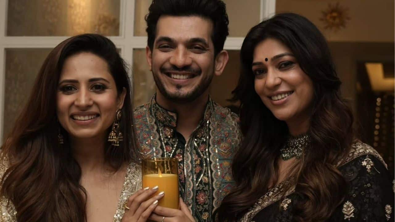Sargun Mehta was seen sharing a cheerful moment with **Arjun Bijlani** and his wife during the Diwali celebration. Dressed in a gorgeous golden outfit, Sargun radiated festive elegance, while Arjun looked dashing in an intricately embroidered kurta. His wife complemented the duo perfectly in a stunning black ethnic ensemble. Their bright smiles and warm camaraderie captured the true spirit of the festivities — joy, friendship, and togetherness.