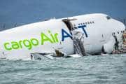 Cargo plane slides off runway in Hong Kong, two dead