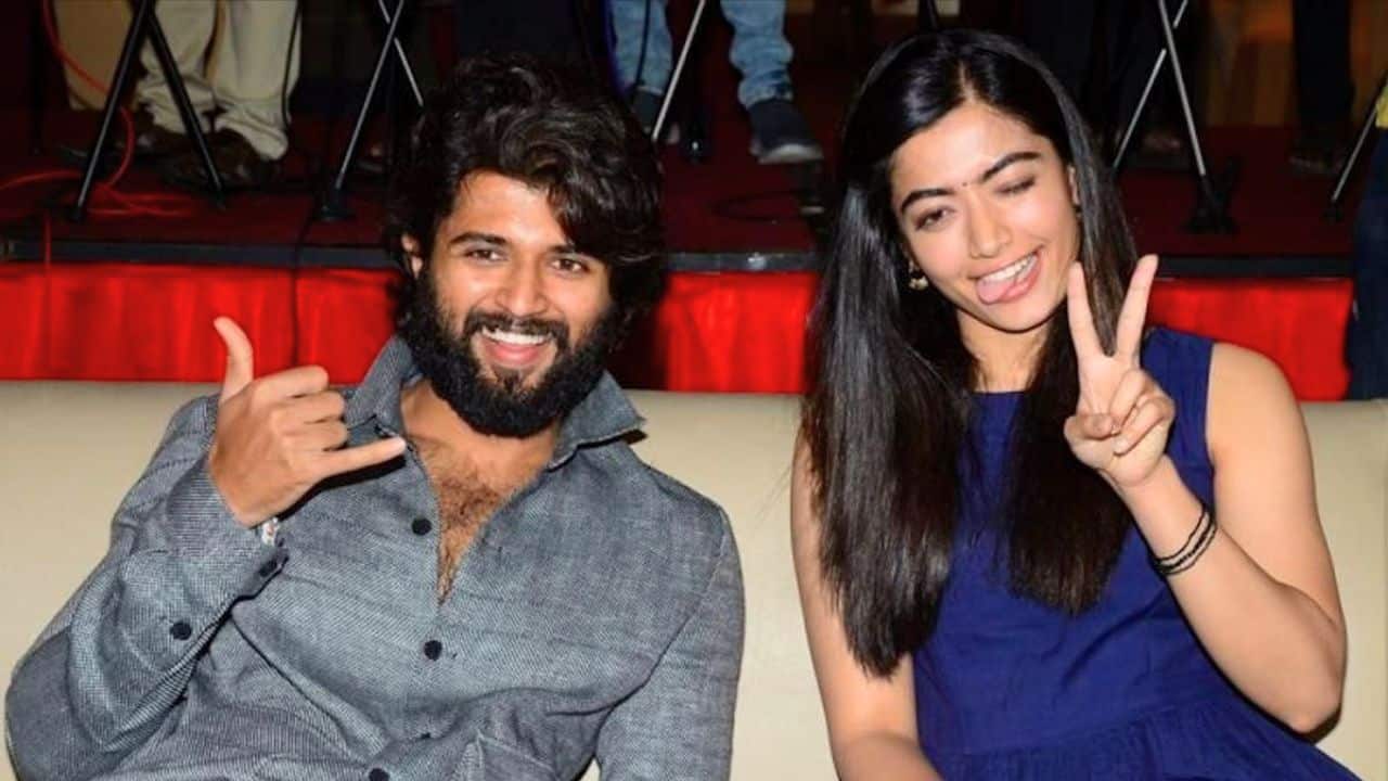 A Riot of Expressions Vijay and Rashmika's playful energy shines through! Vijay’s cool &quot;shaka&quot; sign matches with Rashmika’s cheeky peace-out pose and tongue out, showing their fun and easygoing chemistry on and off-screen. Their adorable camaraderie is always unmissable.