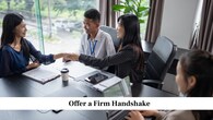 <strong>Offer a Firm Handshake</strong><br />A firm handshake at the start and end of the interview reflects confidence and respect. Make sure your grip is steady but not too strong. Maintain eye contact and a small smile as you shake hands. Avoid limp or overly tight grips, as they can send the wrong message. Practising beforehand can help you get it right.