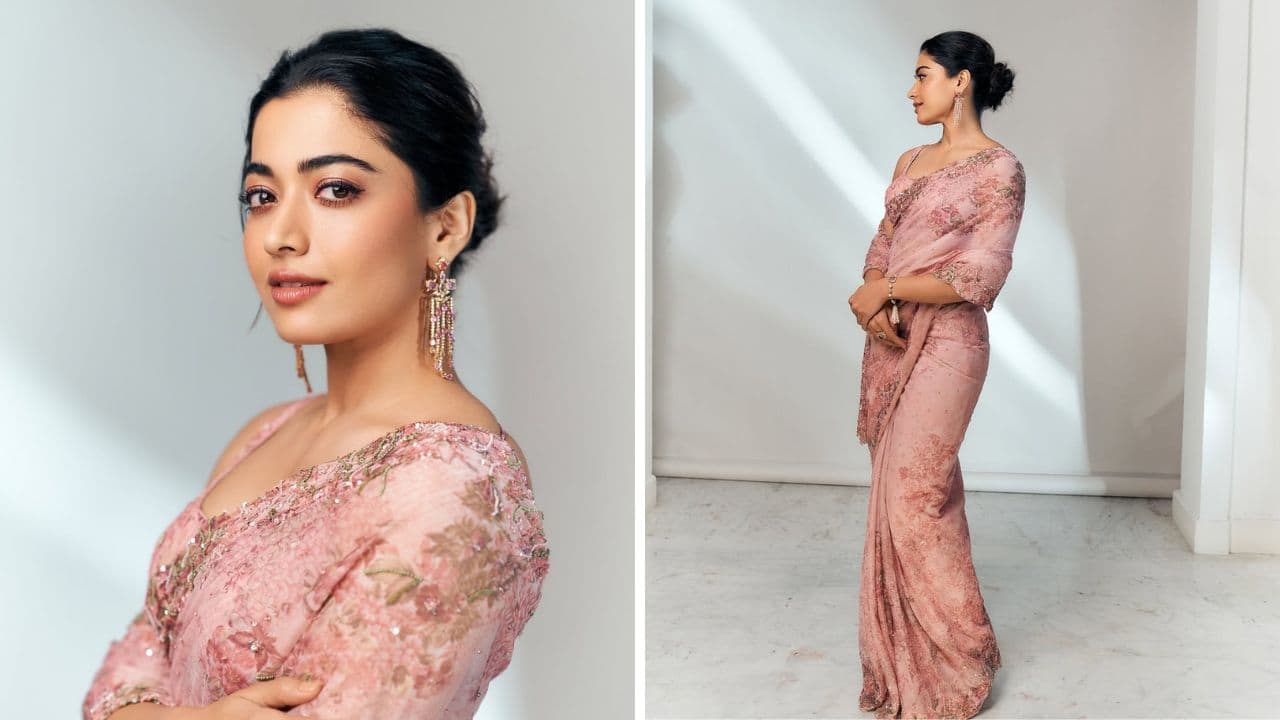Softness in bloom She looks dazzling in this dreamy pink saree beautified with florals and glittering embroidery that set it apart. Her look has been accessorised minimally with earrings, a bracelet, and a ring. Fresh dewy makeup and a messy bun complete her look. (Image: Instagram)