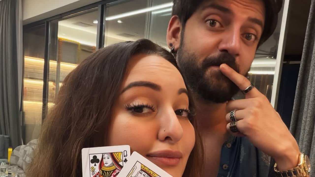 5. Sonakshi and Zaheer share a playful selfie moment during a friendly card game, both flashing their “queens.” The energy is light, fun, and personal—showing a glimpse of their easy chemistry and festive spirit.