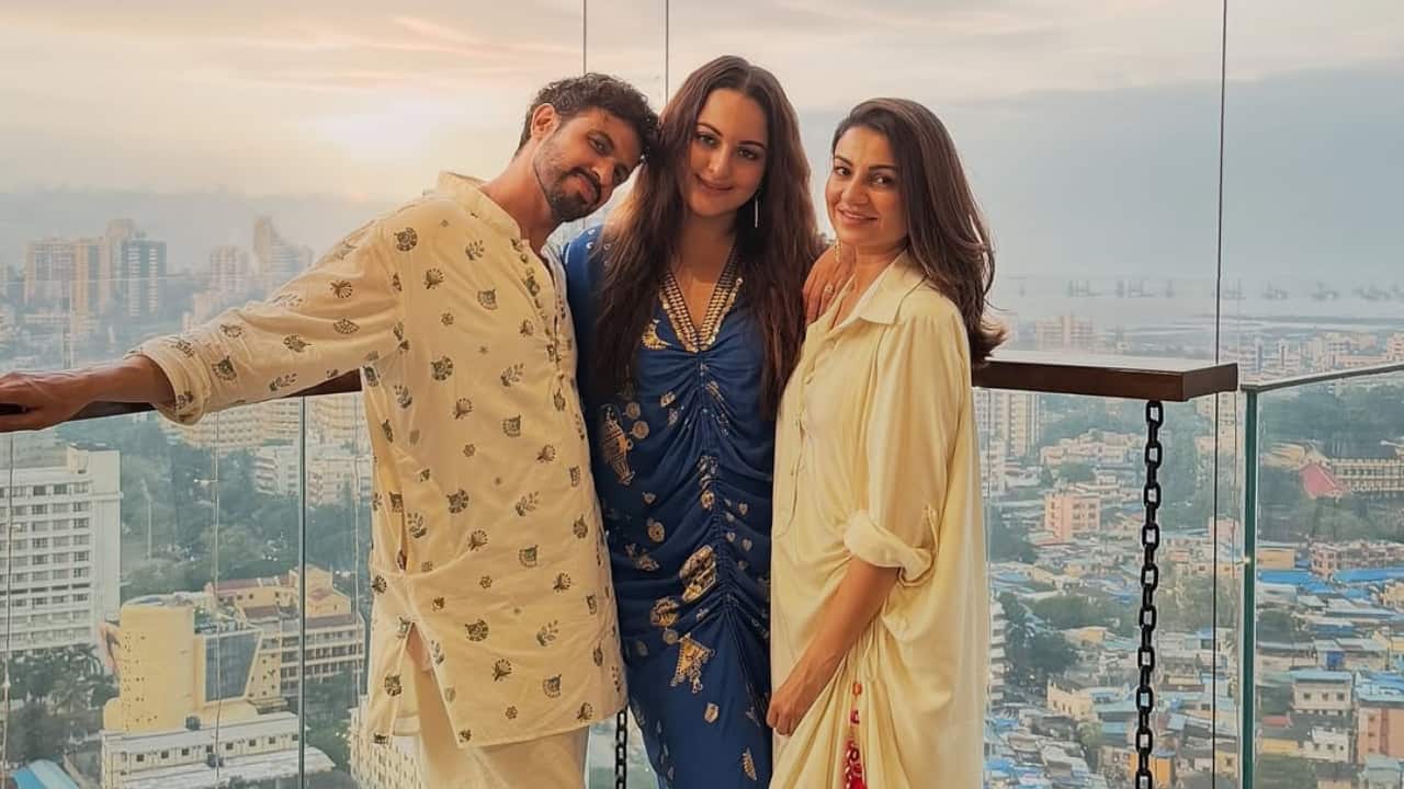 3. Sonakshi and Zaheer are joined by loved ones on their balcony, overlooking a glowing city skyline. The cozy, joyful energy of the gathering captures the spirit of togetherness that defines Diwali nights at home.