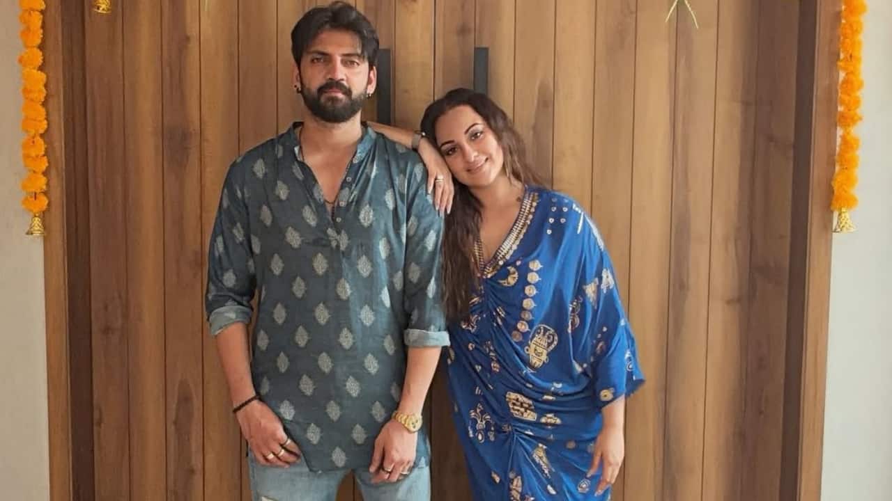 1. Sonakshi Sinha and Zaheer Iqbal beam with joy as they pose at their beautifully decorated home entrance, marking their first Diwali together as husband and wife. The warm floral decor adds to the festive, homely charm.