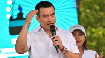 Ecuador's President Daniel Noboa gestures as he speaks during the Guayaquil Independence Festival at the Civic Center in Guayaquil, Ecuador on October 8, 2025.  (Photo by MARCOS PIN / AFP)