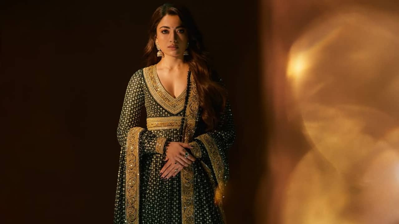 Rashmika glides through ethnic wear like it was made for her. Whether it’s a pastel saree or a hand-embroidered lehenga, she carries it with unstudied grace. The secret isn’t the outfit, it’s the comfort she wears it with—making traditional look modern without trying too hard.