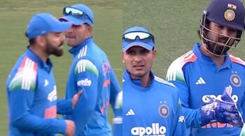 Virat Kohli pulls Shubman Gill by the arm to pass tips, KL Rahul keenly listens