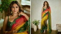 <strong>Festive glam</strong><br />This six-yard drape stands out for its festive charm. The multi-coloured saree is a celebration in itself with its motifs and embroidered green border. The matching blouse with its 3D design also grabs the limelight for adding glamour.