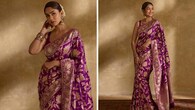 <strong>Traditional glam</strong><br />Mrunal looks elegant in a traditional Indian drape, perfectly tied and paired with a sleeveless blouse. The gajra, bangles, and bindi enhance the desi glam.