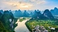 <strong>5. Guilin</strong><br />A Chinese proverb says, “Guilin’s scenery is the best under heaven.” Glide along the Li River, where limestone peaks rise like dragon’s teeth, and discover the storybook village of Yangshuo — a haven for bikers, climbers, and dreamers alike.