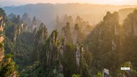 <strong>9. Zhangjiajie</strong><br />Step into the world of Avatar in Zhangjiajie National Forest Park, where sandstone pillars pierce the clouds and glass bridges hover over deep valleys. It’s not just a destination — it’s an experience that defies imagination.