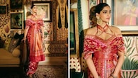 <strong>Sonam Kapoor in a ruby red drape</strong><br />Being a trendsetter, it is not unusual to see Sonam draped in the finest satin silk saree by Ekaya, handwoven in the Kadhwa Banarasi technique. It features intricate motifs, a stylish blouse design, and is cinched at the waist for a structured appeal.