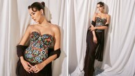 <strong>Ananya Panday</strong><br />The Abu Jani Sandeep Khosla drape showcases festive glamour at its finest. Ananya rocks a Patola-inspired corset with intricate hand embroidery of multi-hued bugle beads. It is paired with a silk Bandhani saree draped as a skirt, adorned with geometric floral motifs in black and red dots. (Image: Instagram)