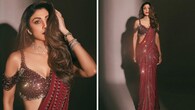 <strong>Shilpa Shetty</strong><br />A true diva, Shilpa shines in a merlot-hued pre-draped saree by Monisha Jaising that looks beautiful on her curvaceous figure. It’s paired with a trendy cold-shoulder blouse studded with rubies and Swarovski crystals. The look is both glamorous and adventurous. (Image: Instagram)