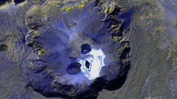 A ‘Skull’ in the Sahara: Volcanic Pit Forms Eerie Face Seen from Space (Image: NASA ASTER/Public Domain))