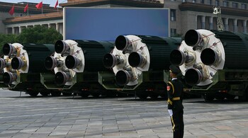 DF-5C intercontinental ballistic missiles are seen during a military parade marking the 80th anniversary of victory over Japan and the end of World War II, in Beijing's Tiananmen Square on September 3, 2025. (Photo by GREG BAKER / AFP)