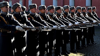 Russian honour guard soldiers of the Leningrad Military District Headquarters perform during the changing of the guard ceremony in the Naryshkin Bastion of the Peter and Paul Fortress in Saint Petersburg on October, 18, 2025. (Photo by OLGA MALTSEVA / AFP)