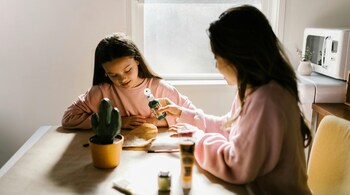 Teen years can be messy — full of discovery, confusion, and growing pains. Here are 7 conversations every parent should have with their teenage daughter — about self-worth, body image, friendships, mental health, and more. (Image: Pexels)