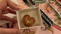 Anshula Kapoor posted this cute photo, which shows a charming moment from Boney Kapoor's 70th birthday celebration. The image displays a heart-shaped cookie that was exquisitely presented in a tiny white box as part of the dinner's dessert. The picture perfectly captures the thoughtfulness and charm of the celebration, set against a floral tablecloth and exquisite silver cutlery.