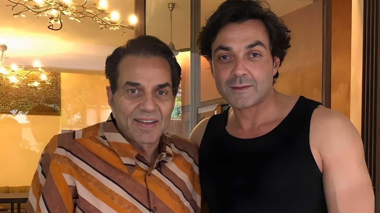 <strong>With the younger son</strong><br />Dharmendra frequently shares pictures with his sons on his social media, capturing sweet family moments. Bobby poses with Dharmendra in this pic, showcasing their strong bond.