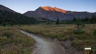 <strong>9. Bald Hills Trail, Jasper, Canada</strong><br /><strong>Route: Maligne Lake, Jasper National Park</strong><br /><strong>Length: 15 km | Duration: Half-day | Best Time: June–September</strong><br />Perfect for beginners, this moderate trail rewards with 360° mountain vistas and sweeping views of Maligne Lake. The summit is an ideal picnic spot — one of the most scenic lunches you’ll ever have.