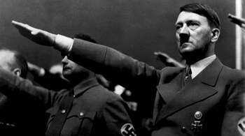 A picture dated 1939 shows German Nazi Chancellor Adolf Hitler giving the nazi salute during a rally next to "Deputy Furhrer" Rudolf Hess. AFP PHOTO / FRANCE PRESSE VOIR (Photo by FRANCE PRESSE VOIR / AFP)