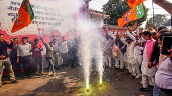 Patna: BJP supporters celebrate their alliance's lead in the initial results of the Bihar Assembly polls, in Patna, Friday, Nov. 14, 2025. (PTI Photo)
