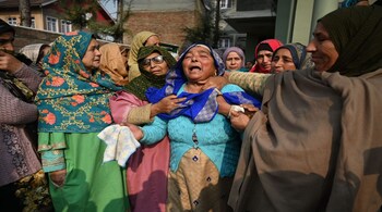 Relatives of Mohammad Shafi Parray, a tailor who was killed in an accidental explosion in J&K's Nowgam. (Photo: PTI)
