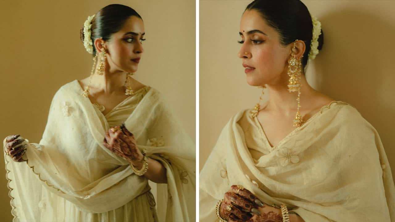 Sanya Malhotra’s Gajra Style A classic white gajra can never go out of fashion. Sanya Malhotra shows how a simple, timeless white suit can be dolled up with stylish Kashmiri-style earrings and a neat hair bun adorned with gajra, a stunning, head-turning look. (Image: Instagram)