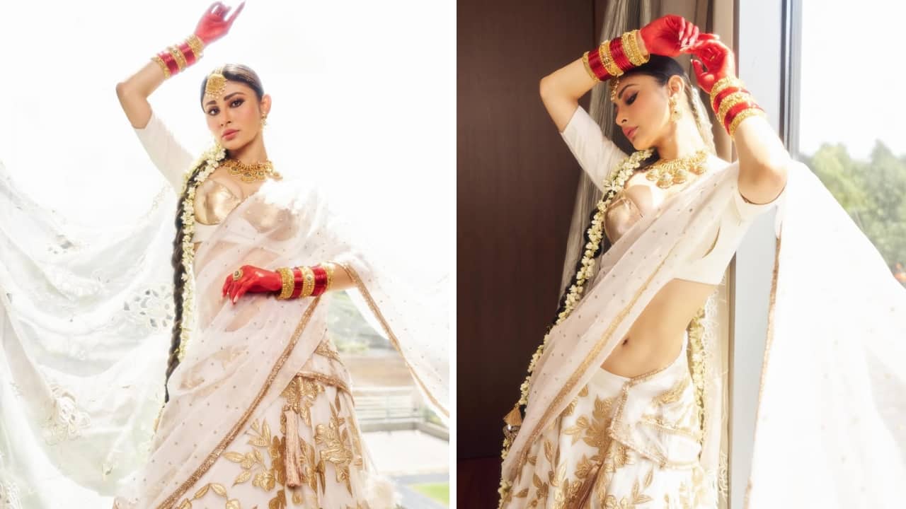 Mouni Roy’s Gajra Braid Impress in a white outfit by styling it right with a neat braid adorned with a long-length gajra, just like Mouni. Her glamorous gold-and-pearl jewels, including a statement maang tikka, earrings, and red-and-gold bangles, add to the dazzle. (Image: Instagram)