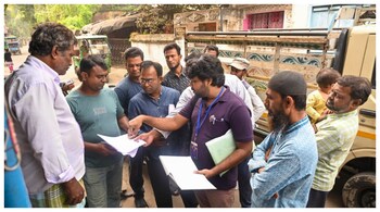  A booth level officer (BLOs) giving enumeration forms to voters as the Special Intensive Revision (SIR) of electoral rolls begins in West Bengal. (Courtesy: PTI photo)