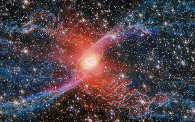 Webb's near-infrared image, which reveals more stars hidden behind the gas and dust. (Image: Webb Telescope/NASA)