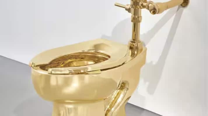 A solid gold toilet sells for Rs 106 crore: The strange story behind Maurizio Cattelan’s most notorious artwork
