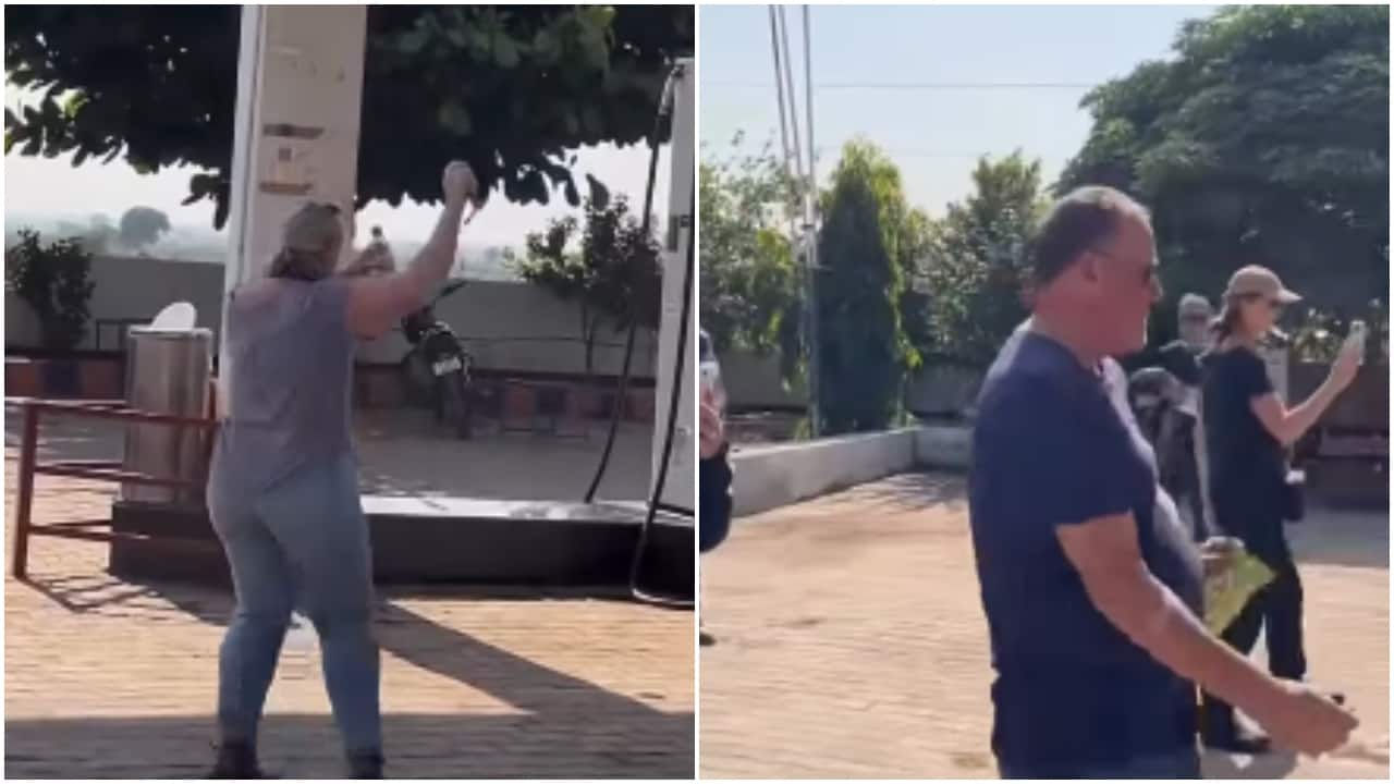 Group of foreign tourist groove to 'Chunari Chunari' blasting from tractor at petrol pump. Viral video