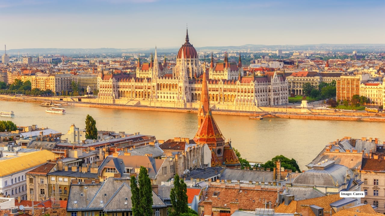<strong>4. Budapest, Hungary – Danube-Side Holiday Magic</strong><br />Vörösmarty tér, Budapest’s oldest Christmas market, glows with twinkling lights along the Danube. Over 100 stalls sell handcrafted toys, gifts, and hearty local food like goulash and strudels. As night falls, live jazz, folk, and blues performances fill the square. It’s a market that perfectly blends history, culture, and culinary delights, creating an unforgettable evening for every visitor.