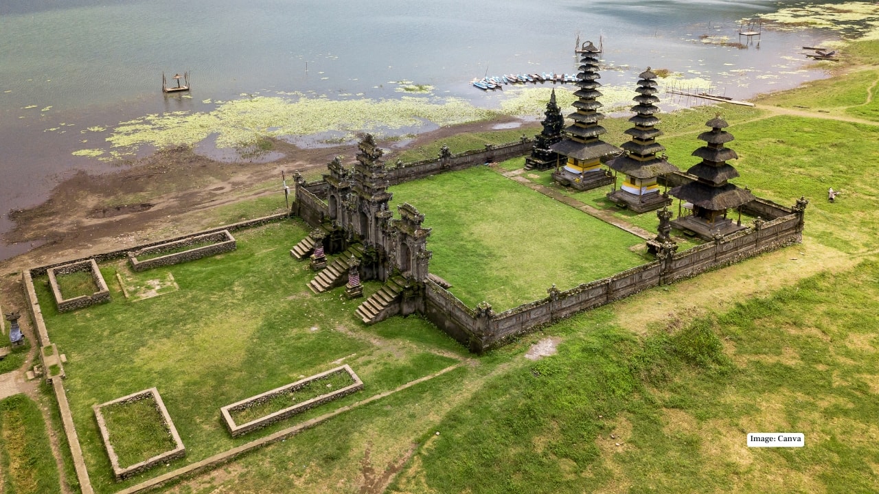 10. Tamblingan Lake, Bedugul In Bali’s mist-kissed highlands lies Tamblingan—a lake so serene it feels sacred, wrapped in dense forest and often veiled in morning fog. Wooden jetties, still waters, and the silhouettes of ancient temples create a dreamlike frame. Arrive at dawn, when the world is hushed and the lake mirrors the sky. This is Bali at its most mystical, and your proposal becomes part of the silence, the mist, the magic.