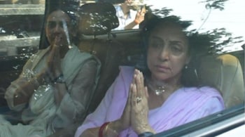 Heartbroken Hema Malini and Esha Deol exit crematorium
