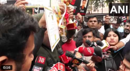 Delhi student suicide: Father joins protest, shows certificates and medals awarded to son