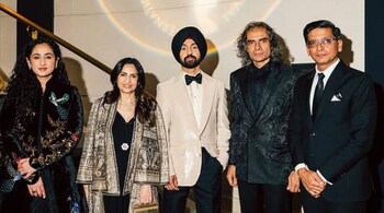 Diljit Dosanjh wore an ivory shirt underneath the blazer, which complemented the delicate hues of his jacket.