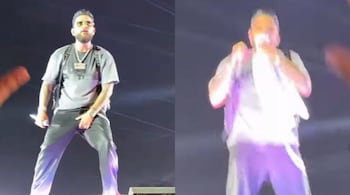 Fan throws T-shirt at Karan Aujla during his show, singer wipes sweat and tosses it back