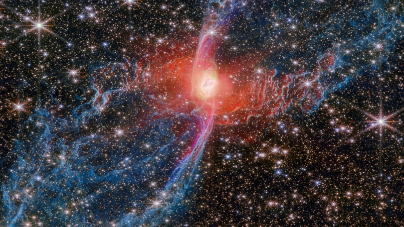 Webb telescope reveals hidden companion that may sculpt Red Spider Nebula