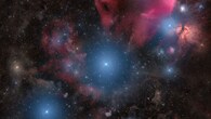 Orion’s Belt stars—Alnitak, Alnilam and Mintaka—shine as massive blue supergiants amid gas and dust clouds, including the Horsehead and Flame Nebulae, in a vibrant 4-degree-wide cosmic view. (Image: Aygen Erkaslan/NASA)